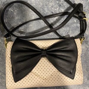 Betsy Johnson Convertible bag perforated black bow